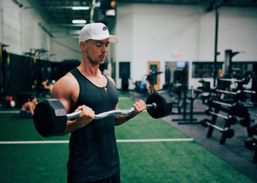 The lifter is performing a lower fatigue level barbell curl
