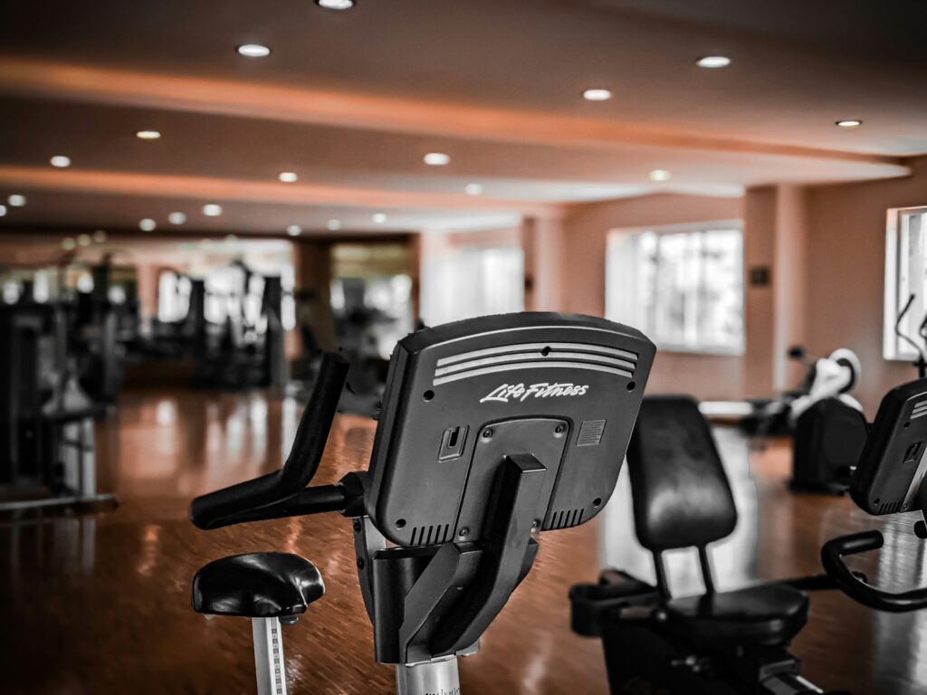 Exercise bike indicates one of the many pieces of equipment that can be used as a fat loss tool