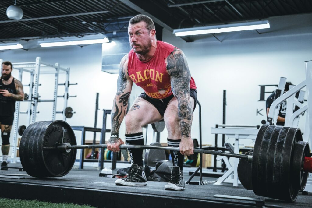 Man performing a standard deadlift