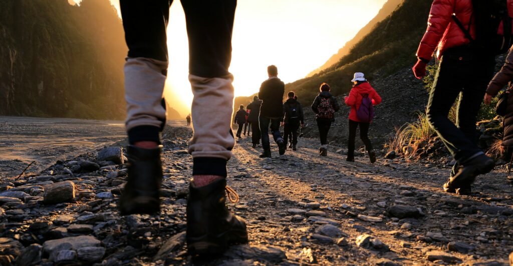 A group of people walking outdoors